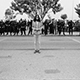 Photo of a man surrounded by police at a 1971 war protest at CSUN