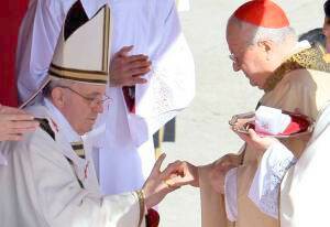 Pope Francis receiving the ring from Card. Sodano