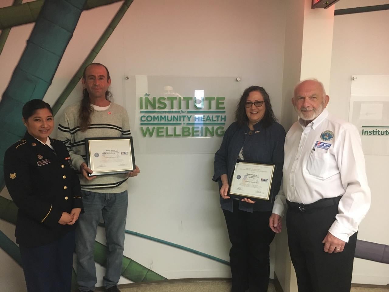 David Boyns and Diane Stephens proudly display their Patriot Awards.