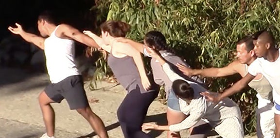 student dancers emulate a river on location at the LA river.