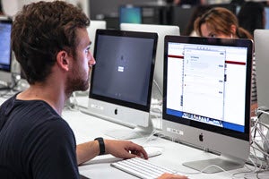 Man using a desktop computer. 
