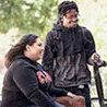 Two students under a tree.