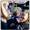 Photo of CSUN student waving at graduation