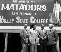 CSUN Founders in front of billboard: The Home of the Matadors-San Fernando Valley State College.