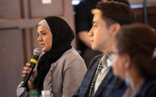 student with microphone