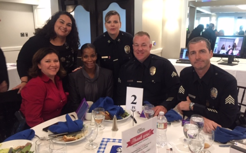 People gathered around a table at the LAPD Chief &amp; Captain&#039;s Luncheon