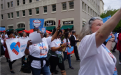 People march at Survivors Speak in Sacramento