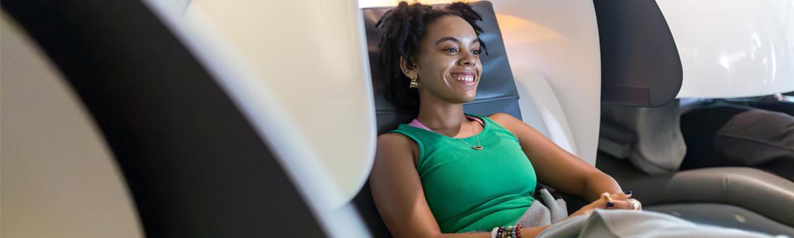 CSUN student using the Oasis Nap Pod