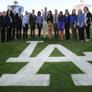 field at dodger stadium with scholars and supporters