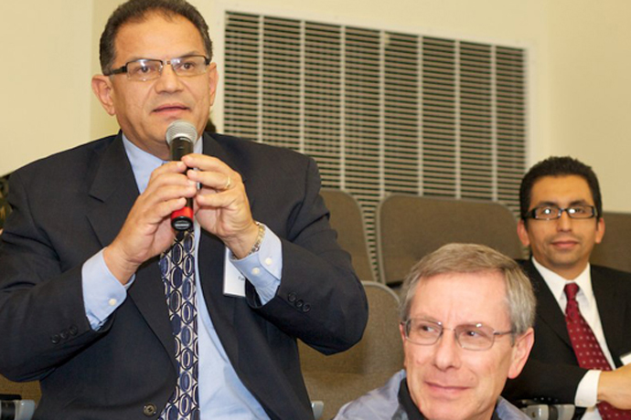 Former Associated Students President and Alumni Association Board member Carlos Fuentes ’82 and Alumni Association Chapter Presidents  Bob Finkelstein '78 and Giovanni Trivino '00, MPA '02