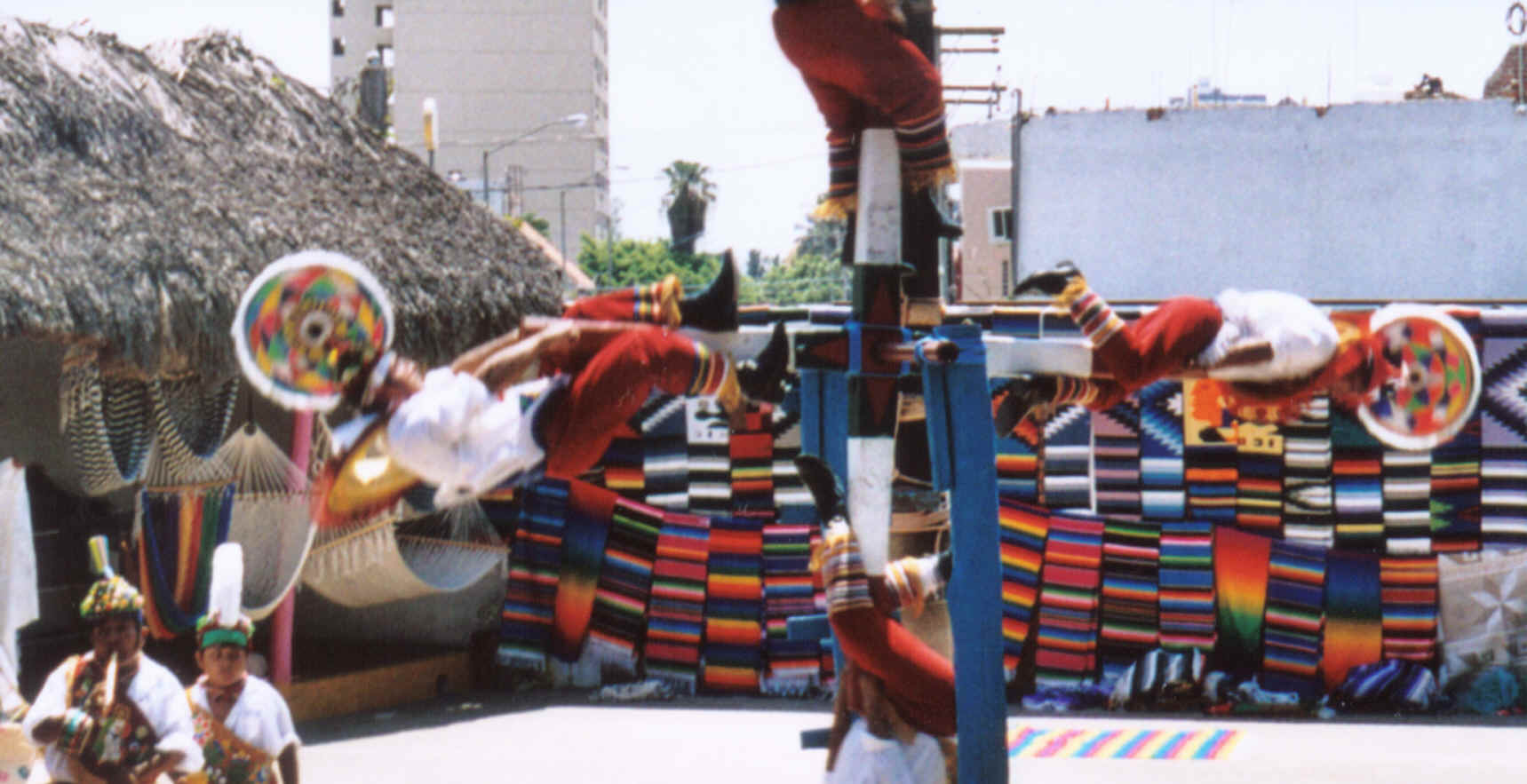 Picture: Picture we took of Four local mans getting ready to start the flying dancers show in Mazatlan, Mexico(AUG 2004)